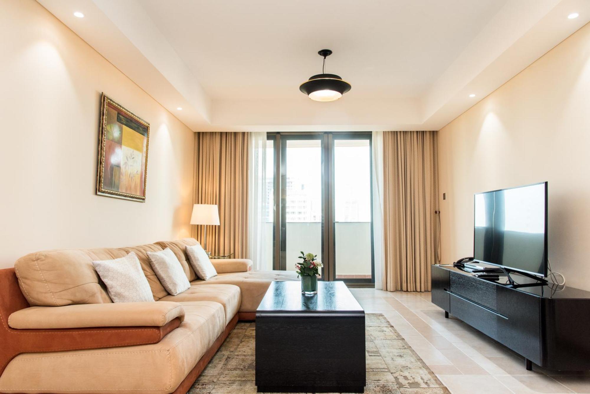 Sherwood Residence Ho Si Minh-város Kültér fotó A living room in a serviced apartment in Dubai