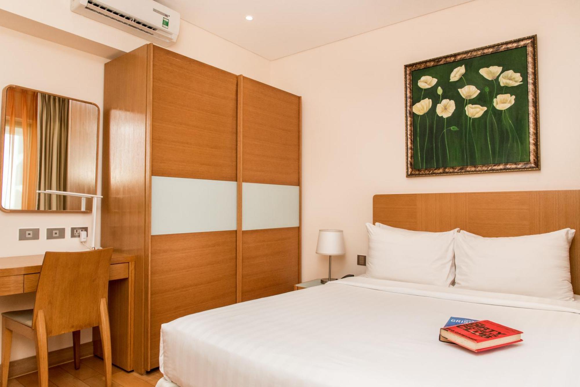 Sherwood Residence Ho Si Minh-város Kültér fotó A bedroom at the hotel