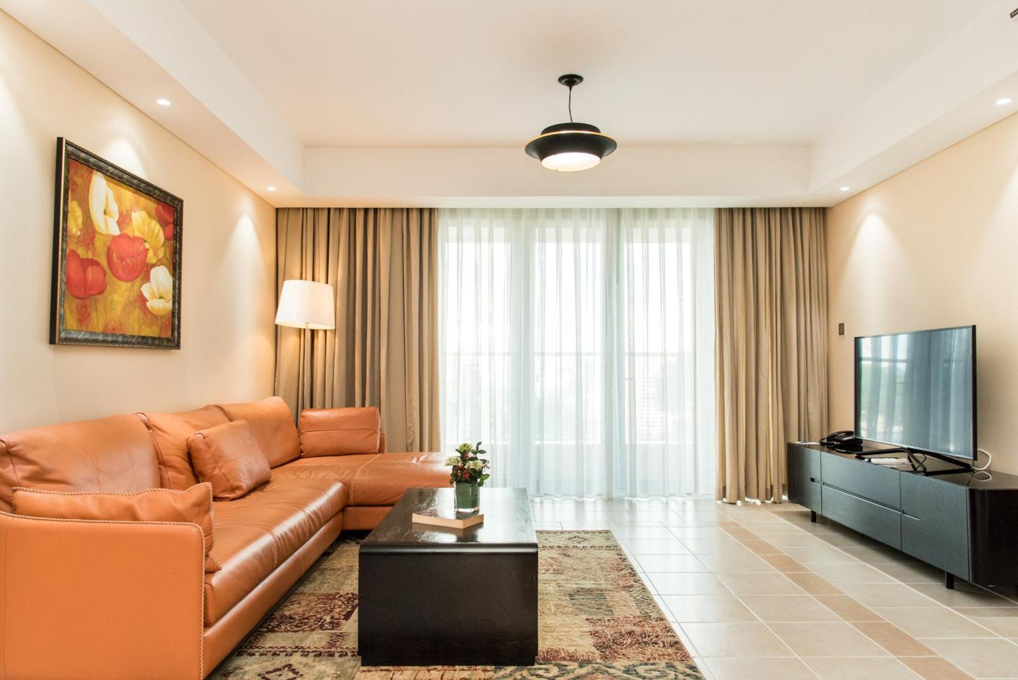 Sherwood Residence Ho Si Minh-város Kültér fotó A living room in a hotel